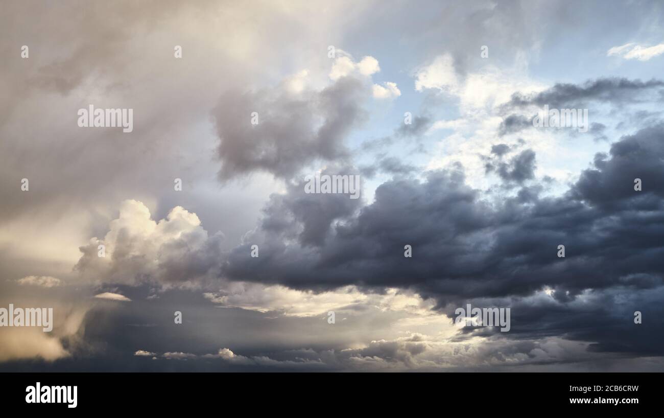 Dramatic cloudscape before the storm at sunset. Stock Photo