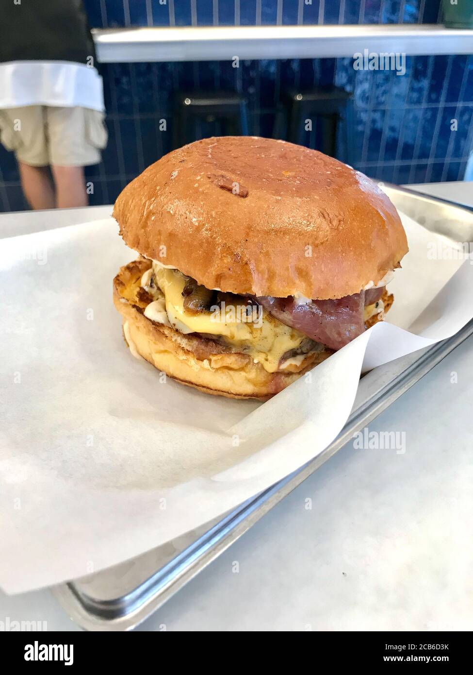 Fast Food Hamburger with Aioli Sauce, Cheddar Cheese, Mayonnaise and