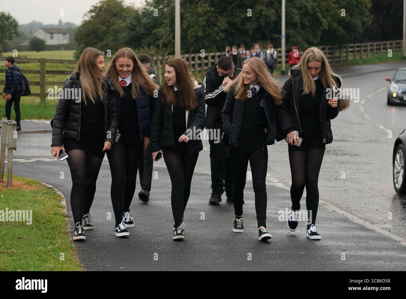 Pupils arrive at Kelso High School on the Scottish Borders as schools in Scotland start