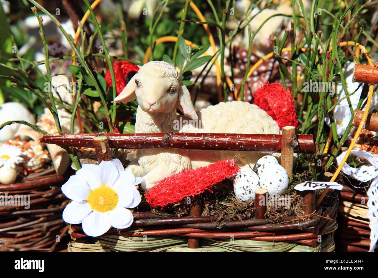 easter background with small sheep in the spring nature Stock Photo