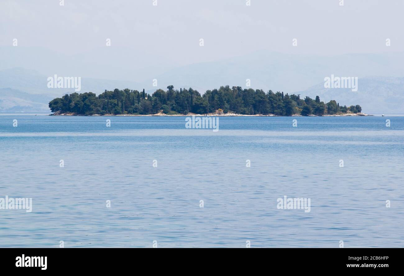 Island on approach to Albania from Corfu Stock Photo