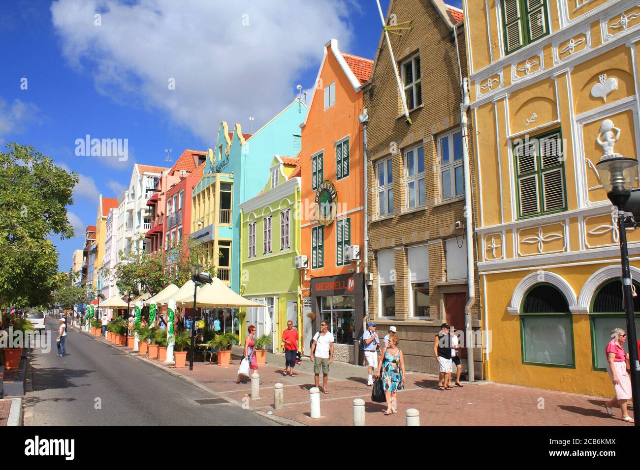 WILLEMSTAD, CURACAO - FEBRUARY 11, 2014: Colorful waterfront houses in Willemstad historic district Punda on Curacao island. The city center is UNESCO Stock Photo