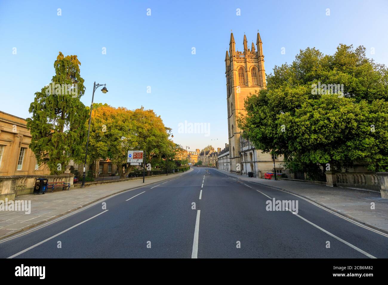 Magdalen Bridge and Magdalen Tower in Oxford at sunrise with no people around, early in the morning on a clear day with blue sky. Oxford, England, UK. Stock Photo