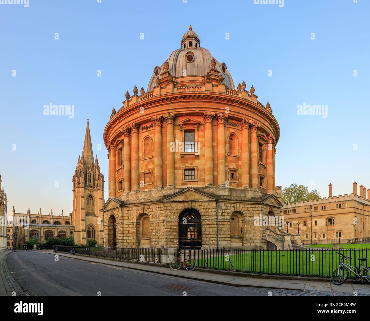 The Radcliffe Camera in Oxford at sunrise with no people around, early in the morning on a clear day with blue sky. Oxford, England, UK. Stock Photo