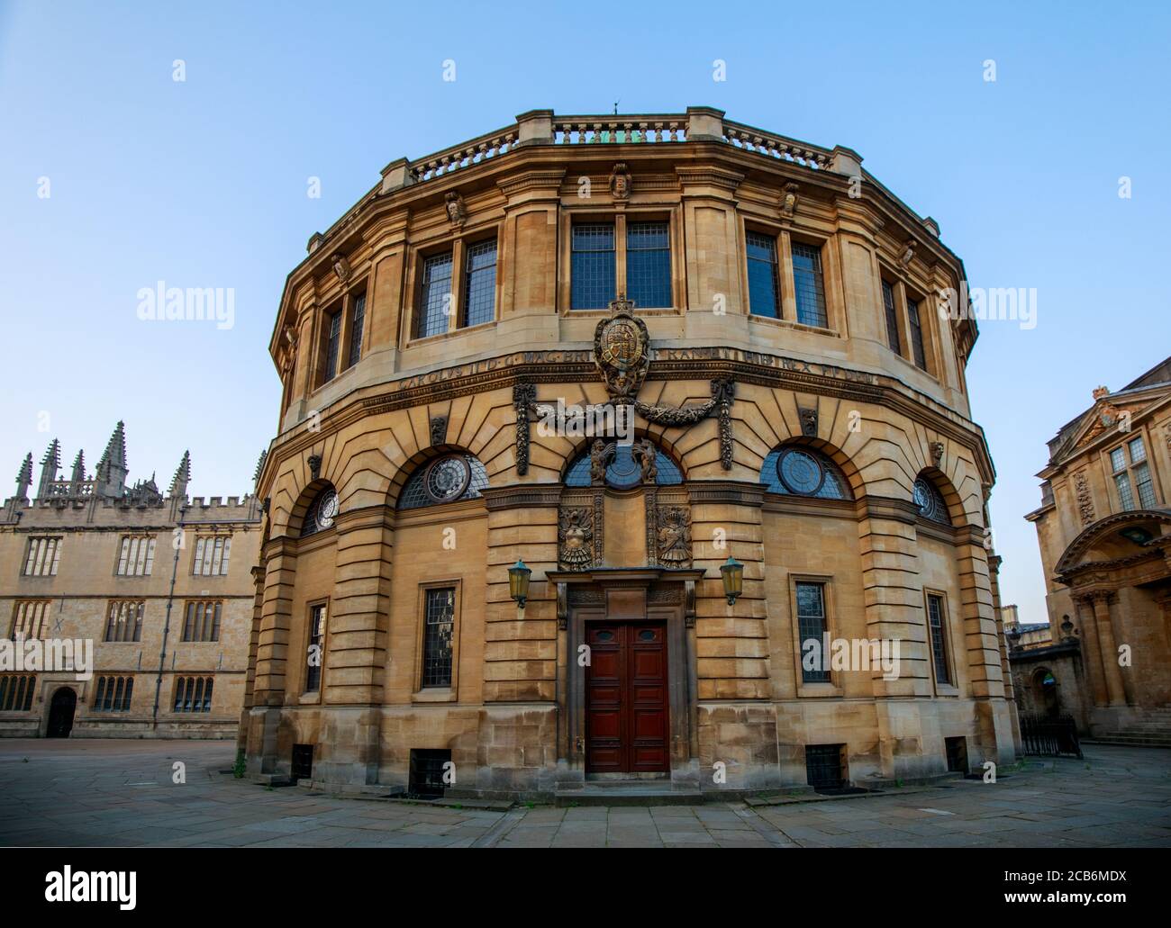 The Sheldonian Theatre from Broad Street in Oxford with no people. Early in the morning. Oxford, England, UK. Stock Photo