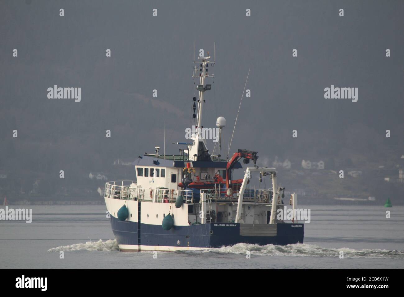 The Scottish Environmental Protection Agency's research vessel Sir John Murray, passing Greenock on the Firth of Clyde. Stock Photo