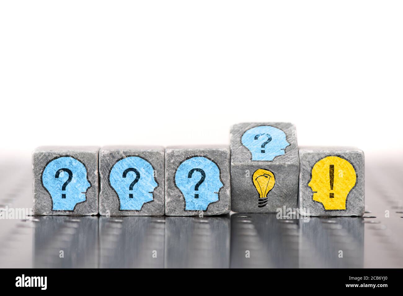 question and creative ideas printed on stones Stock Photo