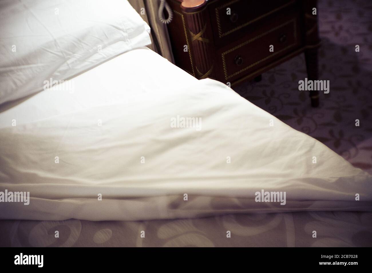 Open bed with bed sheets off. No people Stock Photo Alamy