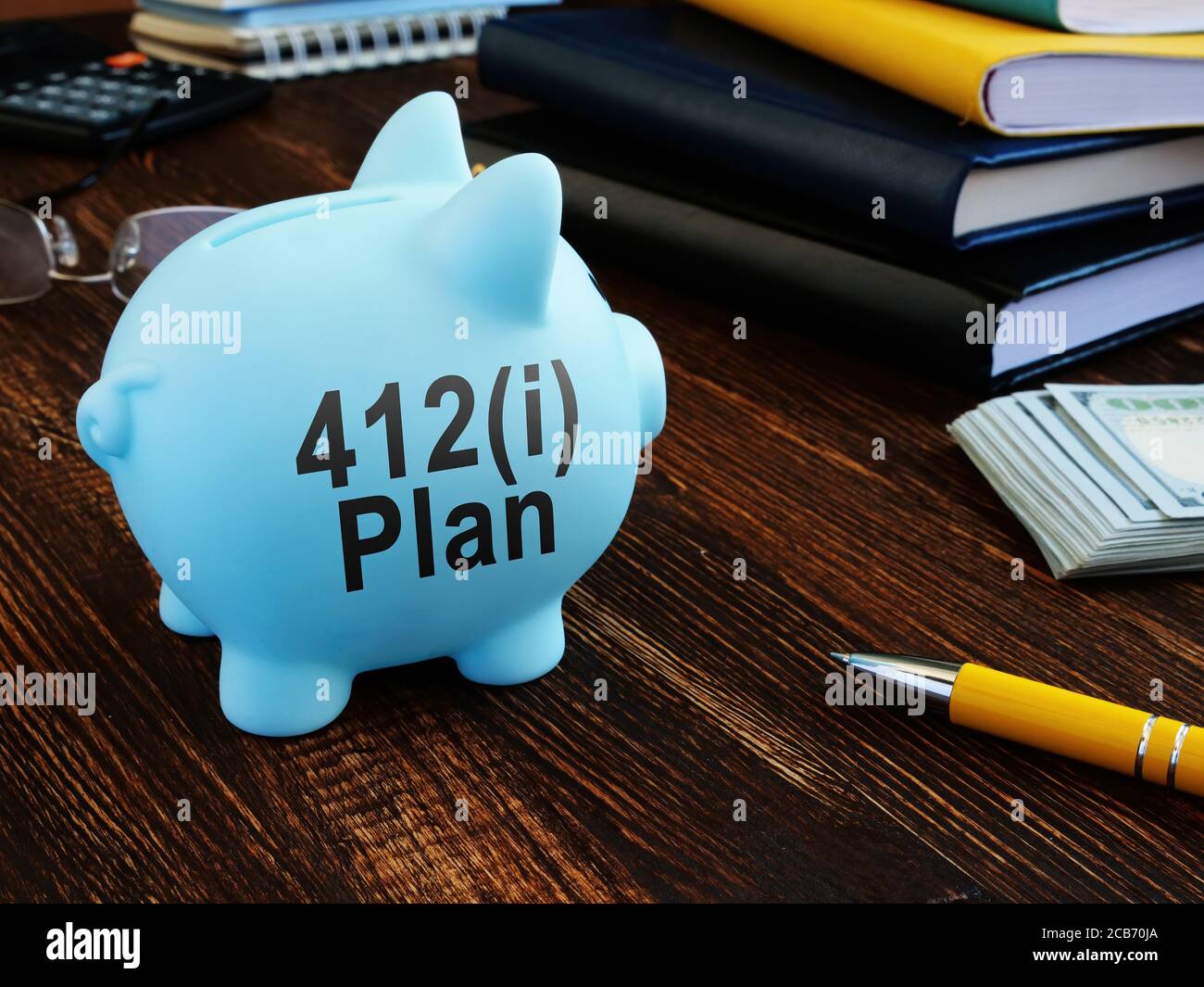 412i plan on the side of piggy bank. Pension concept. Stock Photo