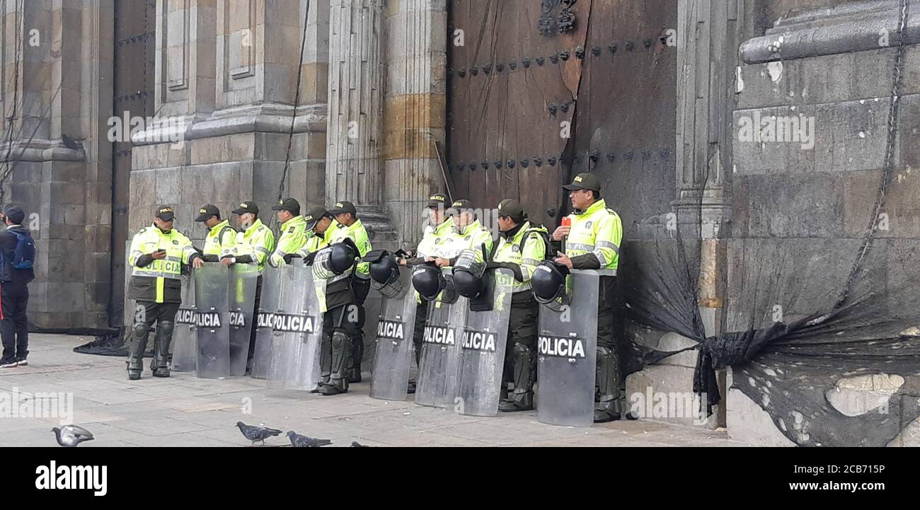 Colombian riot police and army patrol at streets during the protests at city centre. Bogota / Colombia - November 27, 2019. Stock Photo