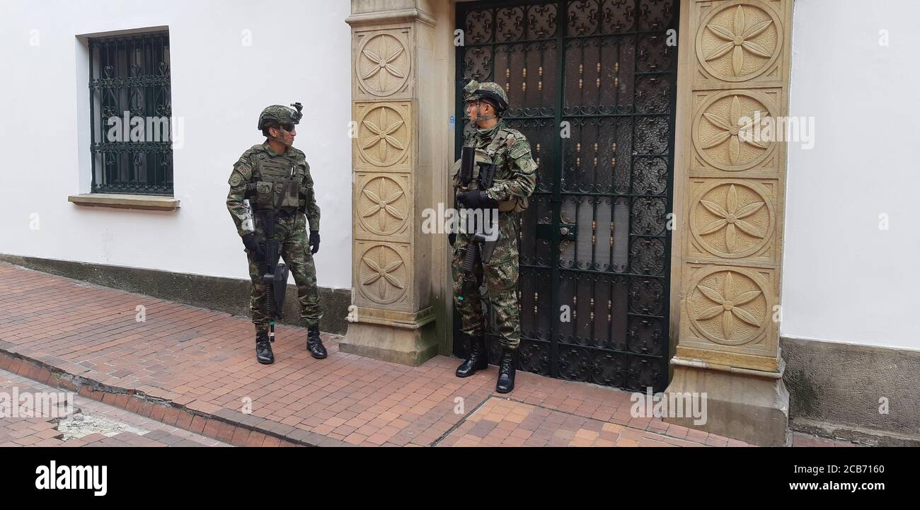 Colombian riot police and army patrol at streets during the protests at city centre. Bogota / Colombia. Stock Photo