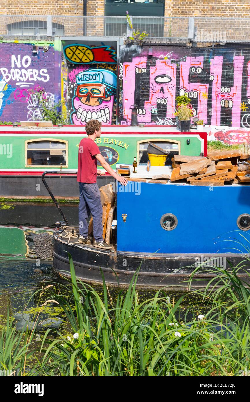 England London Stratford Park Hackney Wick graffiti No Borders Wisdom Cash canal River Lee Lea water barge house boat boats Stock Photo