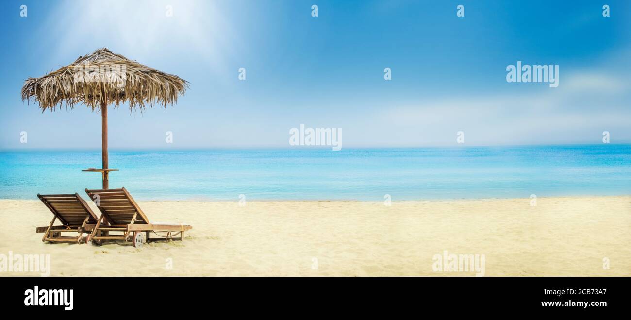 Summer Holiday Travel Background Tropical Island Luxury Resort Hotel Vacation Sun Umbrella And Chairs On Sandy Beach Stock Photo Alamy