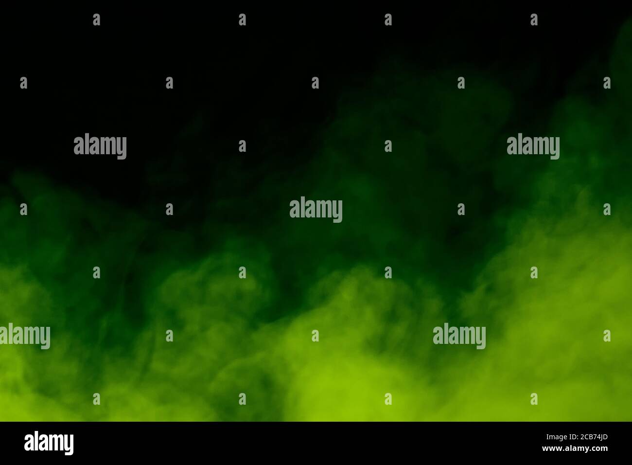 bright green steam on a dark background concept of smoking and ...