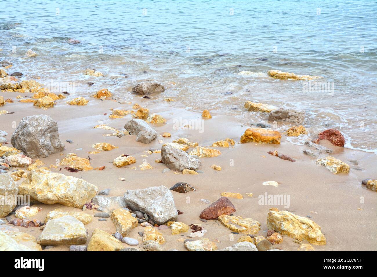 Stones on the beach in Serra da Arrabida, Portugal. Stock Photo