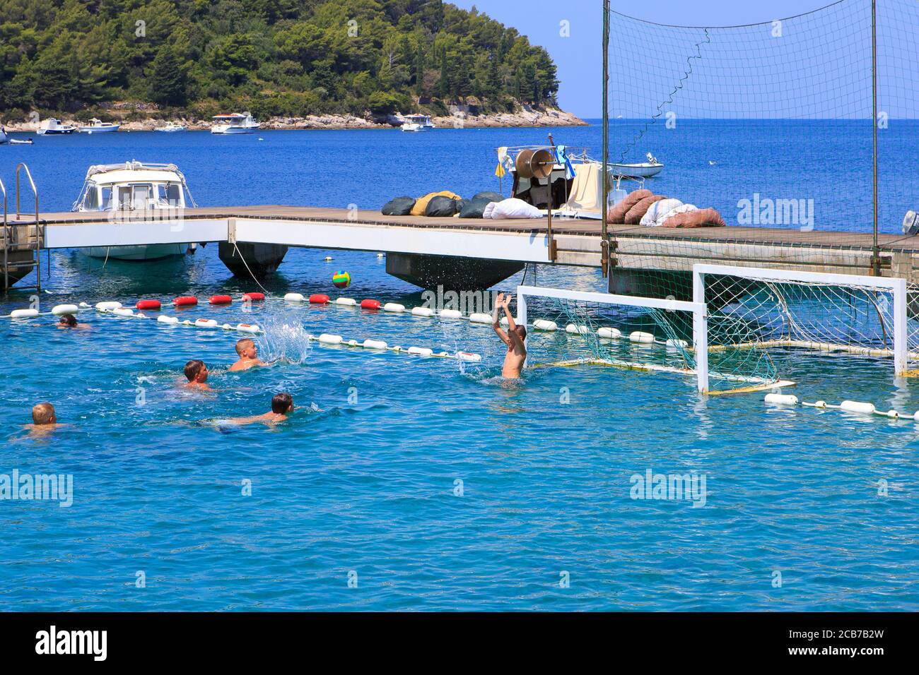 Young boys playing water polo during summertime in the bay of the  picturesque village of Cavtat (Dubrovnik-Neretva County), Croatia Stock  Photo - Alamy