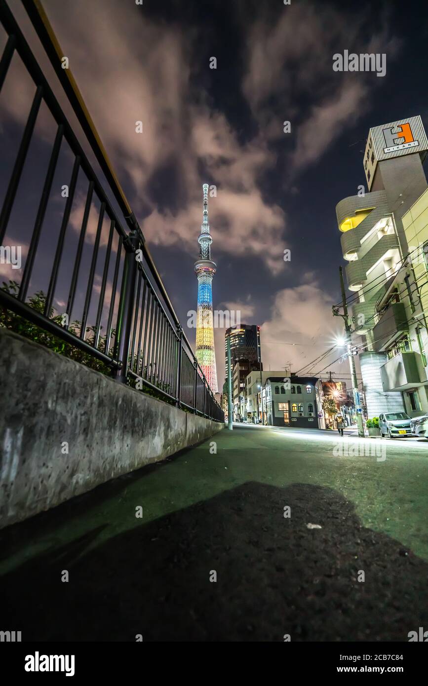 TOKYO, JAPAN - Mar 28, 2019: Tokyo Skytree, Sumida Ward Urban night scene. Tokyo Skytree tower reflections on the canal. Stock Photo