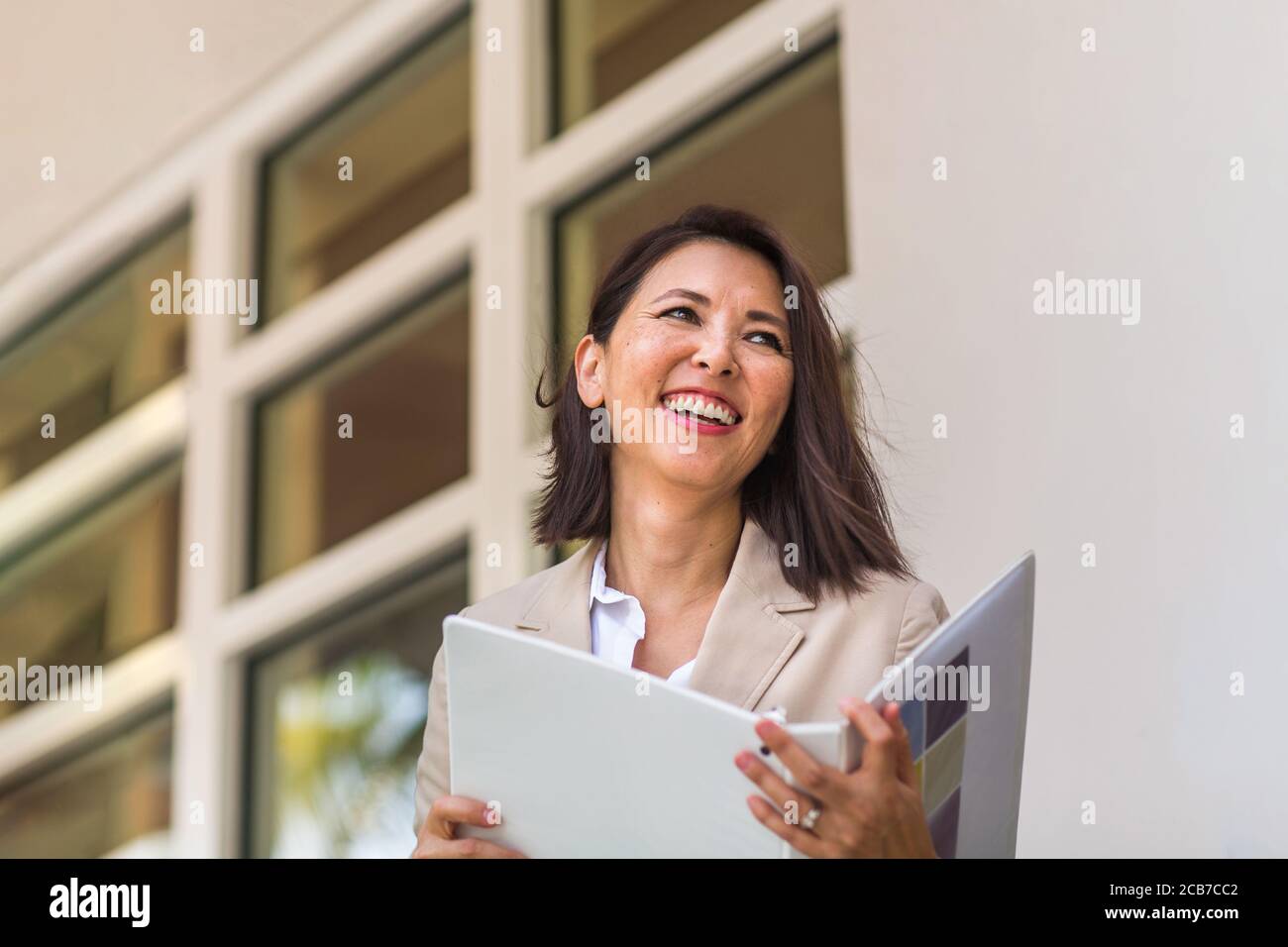 Portrait of a confident Asian businesswoman smiling. Stock Photo