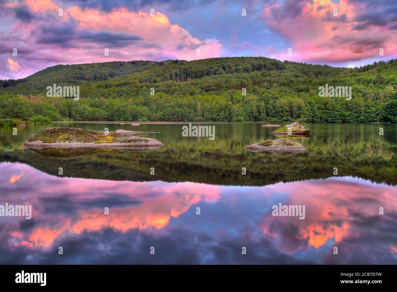 Wonderful sunset sunrise over landscape mirroring in the water surface, the best photo Stock Photo