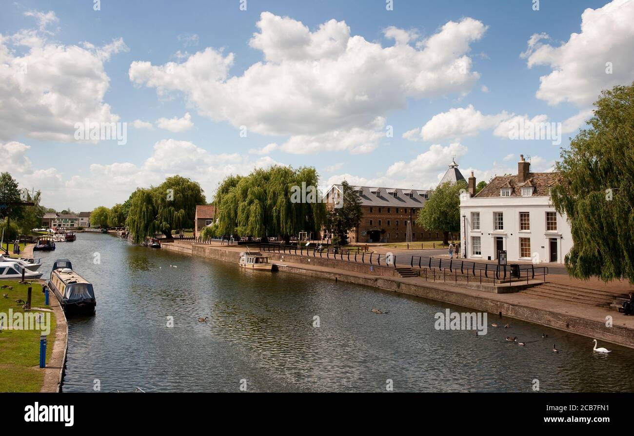 Boats moored on the River Great Ouse in the cathedral city of Ely, Cambridgeshire, England. Stock Photo