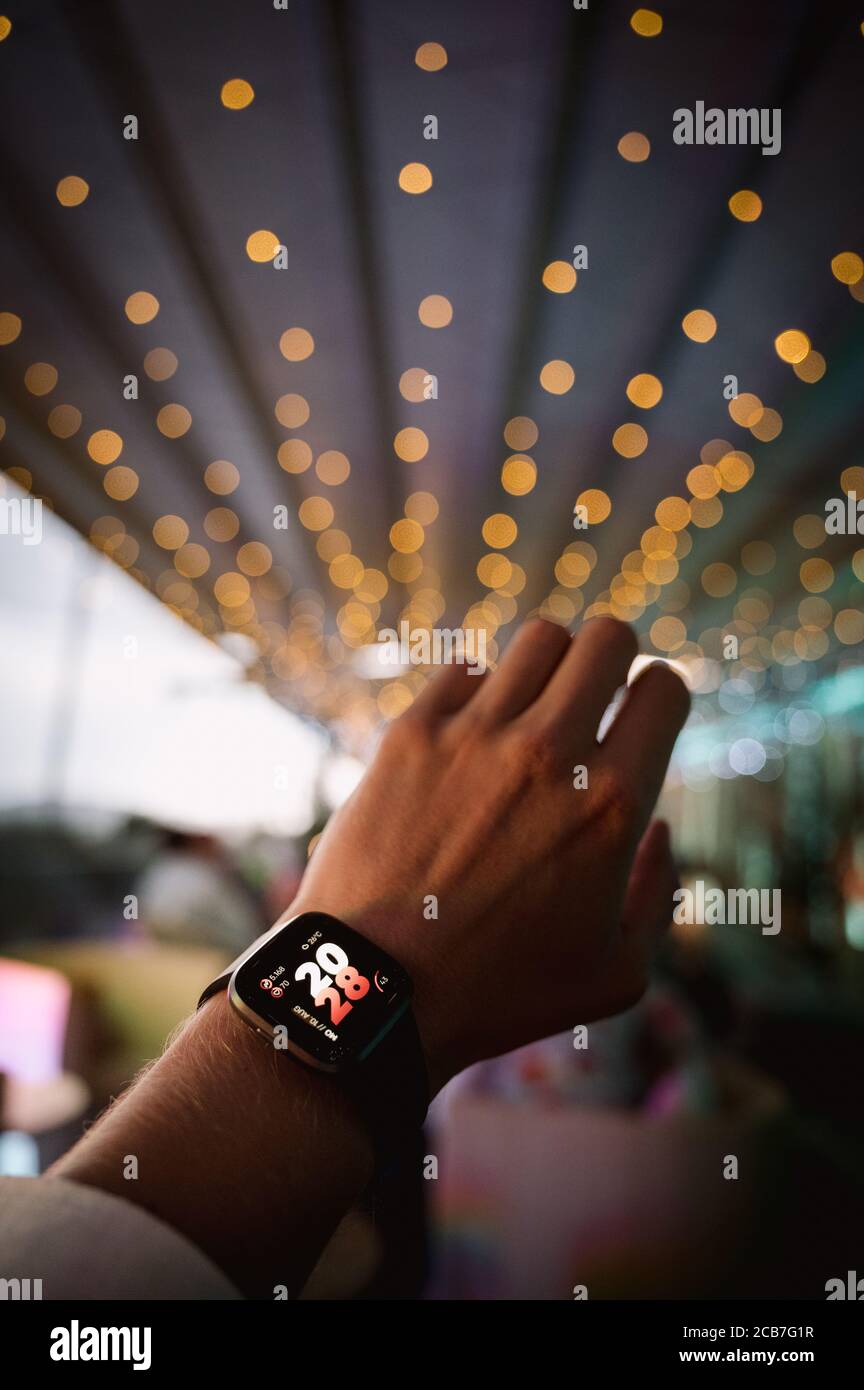 modern smart watch on a males hand with beautiful bokee Stock Photo