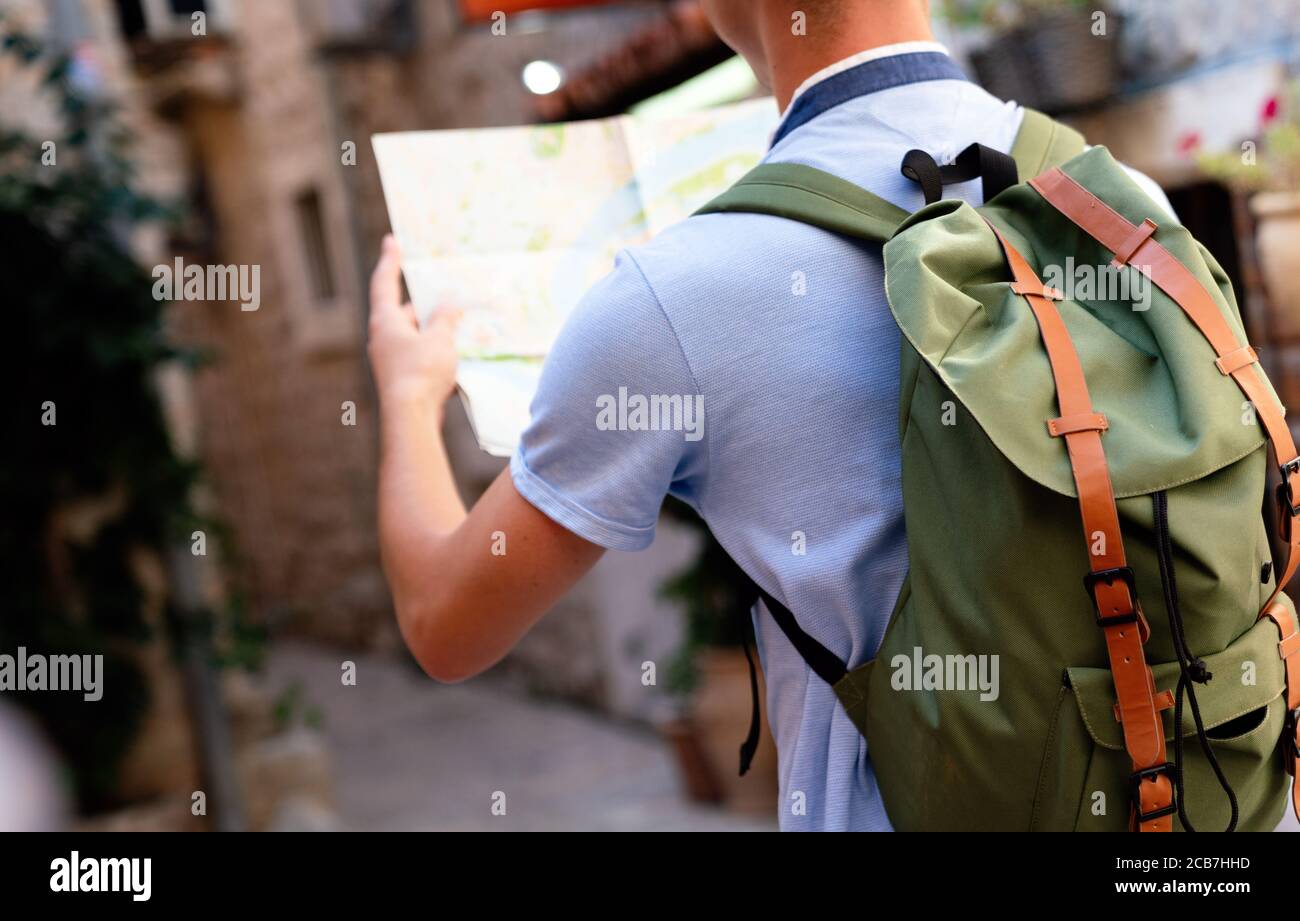 Traveler with map. Travel people fun tourism vacation concept Stock Photo