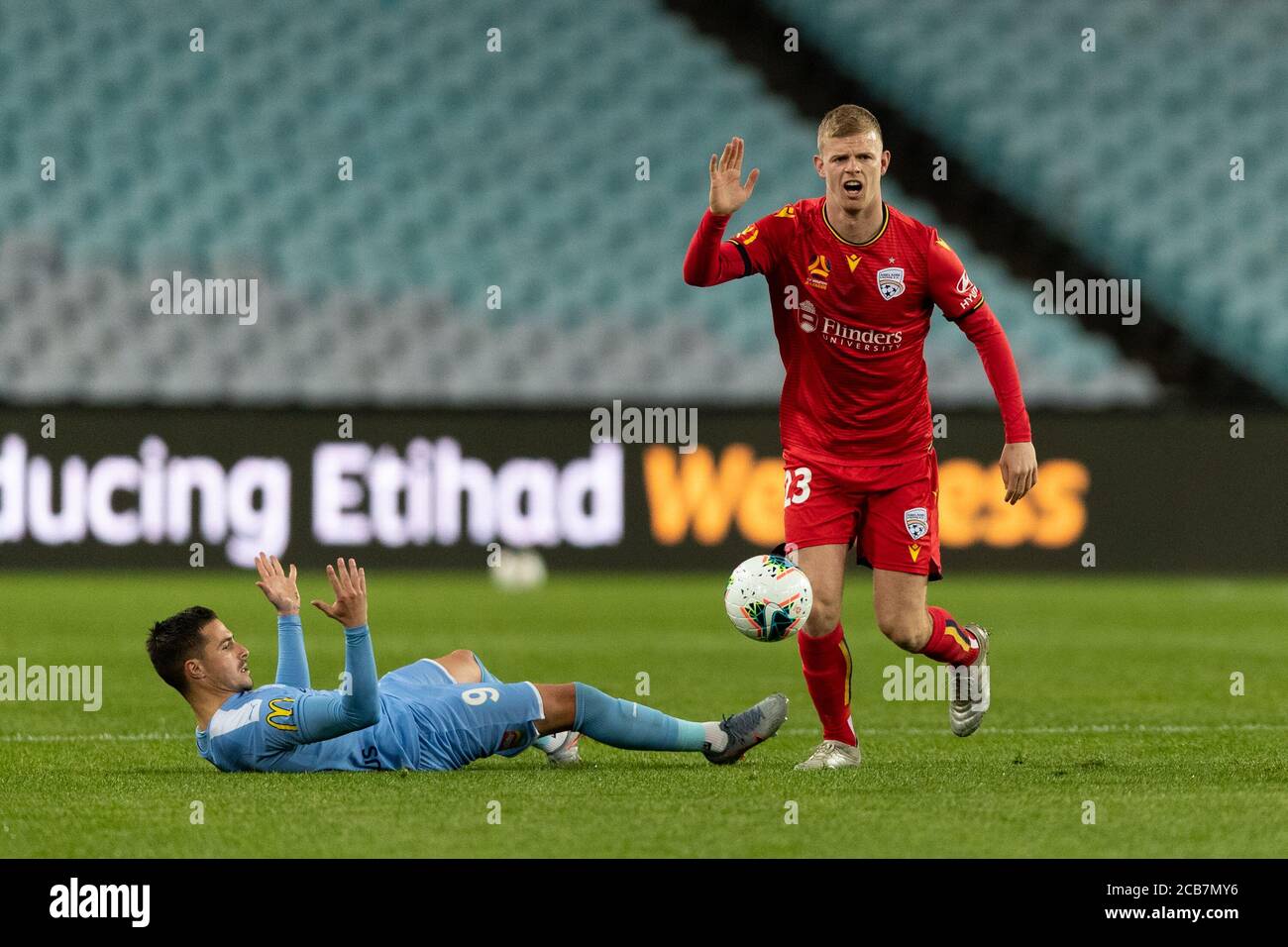 Sydney, Australia. 11th Aug, 2020. Adelaide United defender Jordan Elsey  (23) wins the ball during the Hyundai A League match between Melbourne City  and Adelaide United at the ANZ Stadium, Sydney, Australia