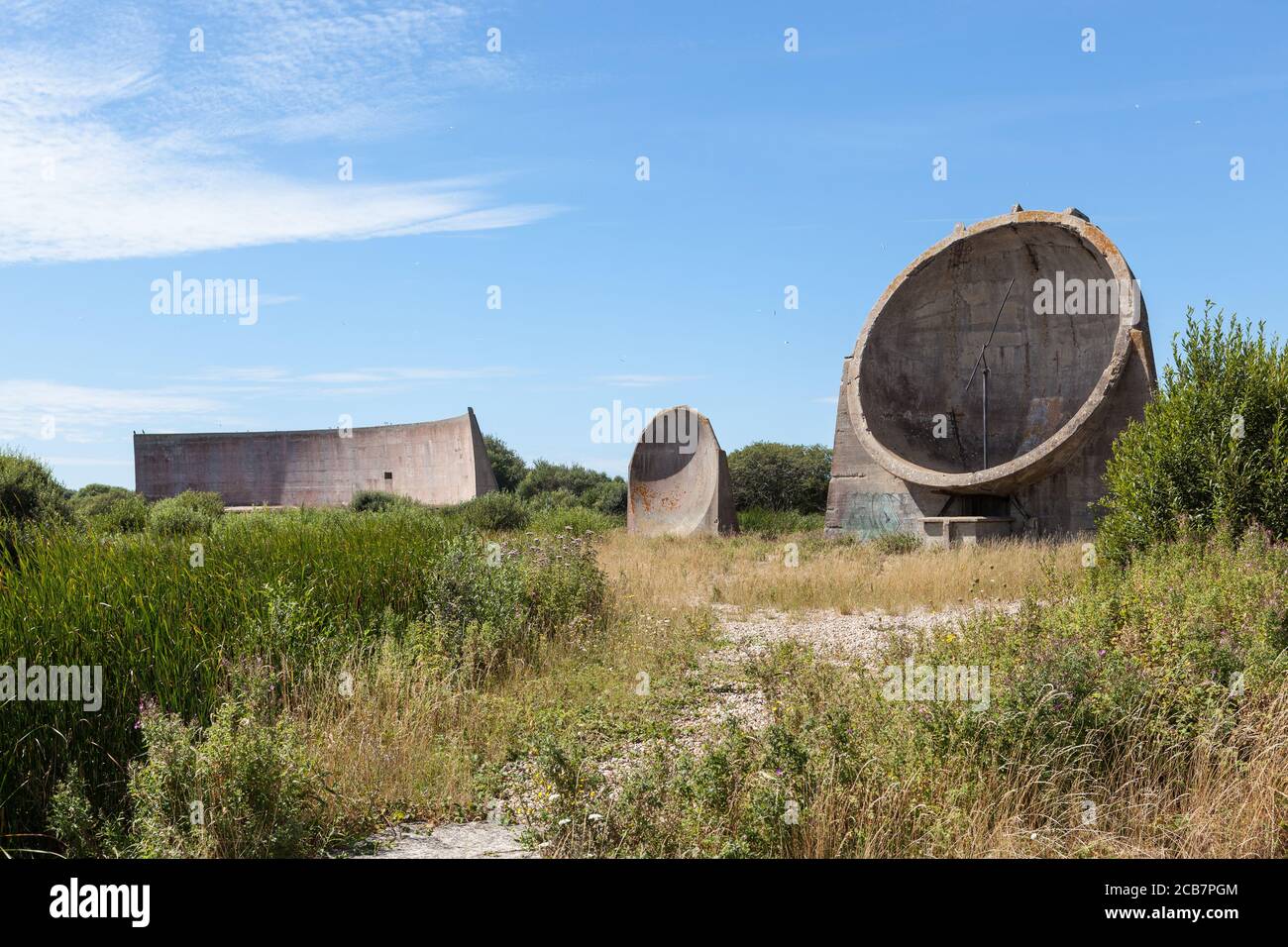 Denge sound mirrors or listening ears. Concrete structures designed to pick up enemy aircraft coming from the channel. Built 1924 on Romney Marsh. Stock Photo