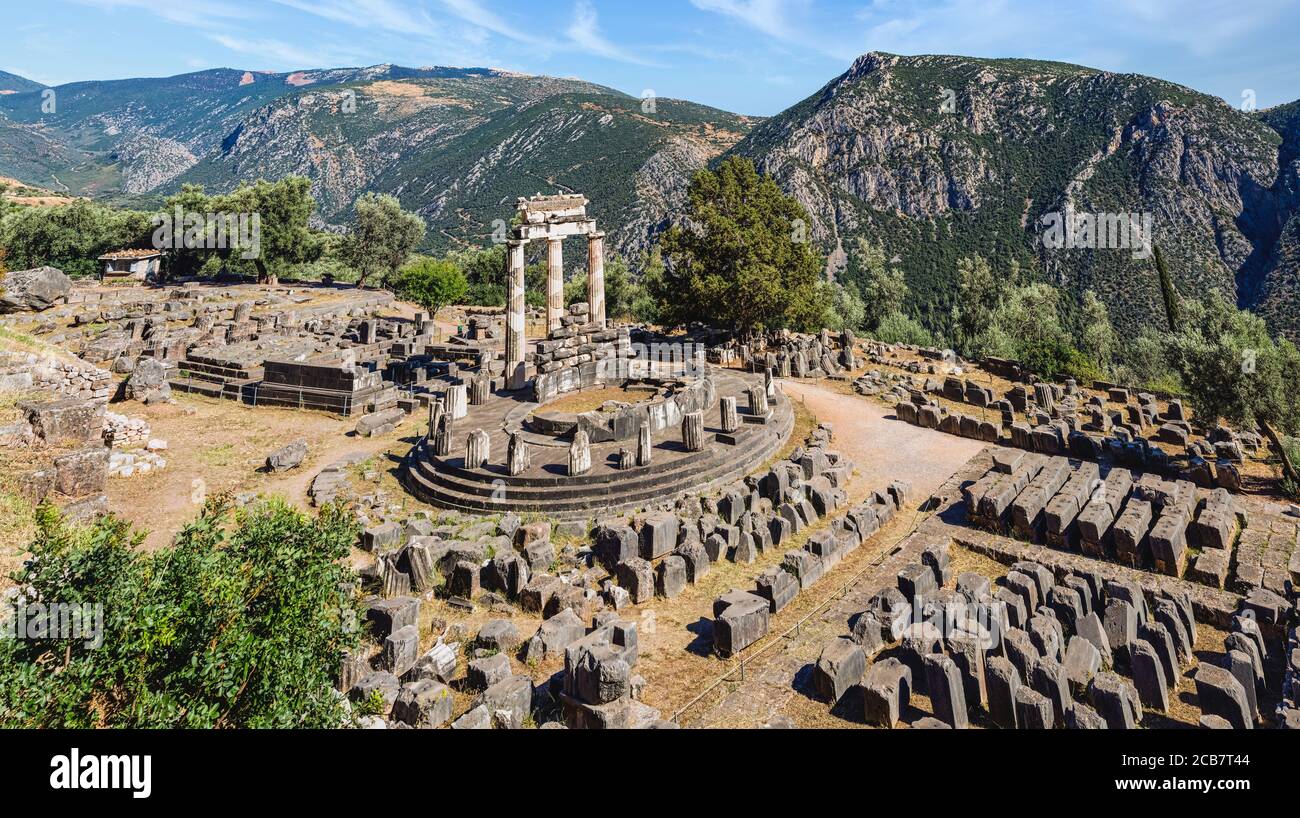 Delphi, Phocis, Greece.  The tholos beside the Sanctuary of Athena Pronaia.  Ancient Delphi is a UNESCO World Heritage Site. Stock Photo