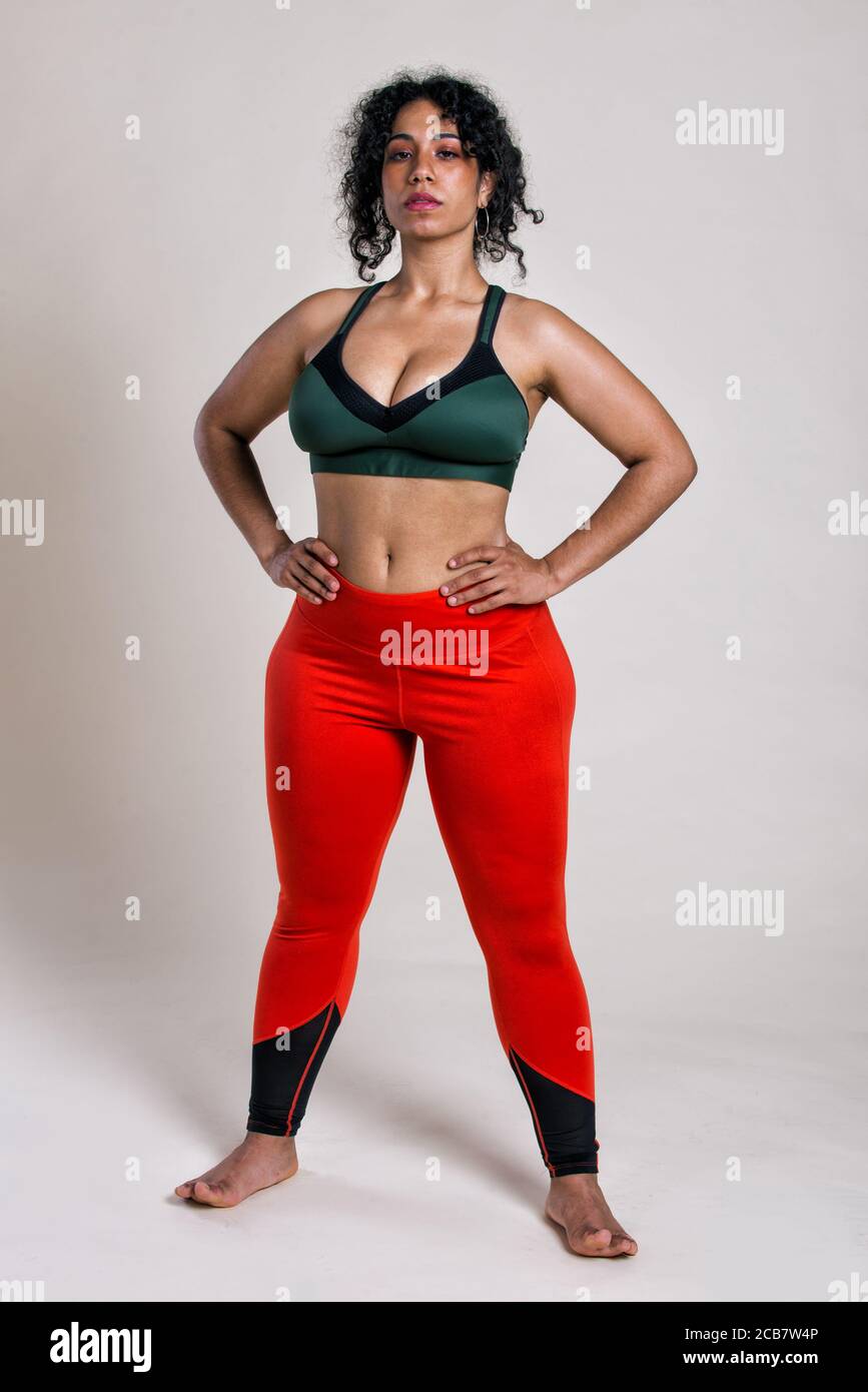 Plus size woman making sport and fitness. Studio portraits with curvy girl  Stock Photo - Alamy