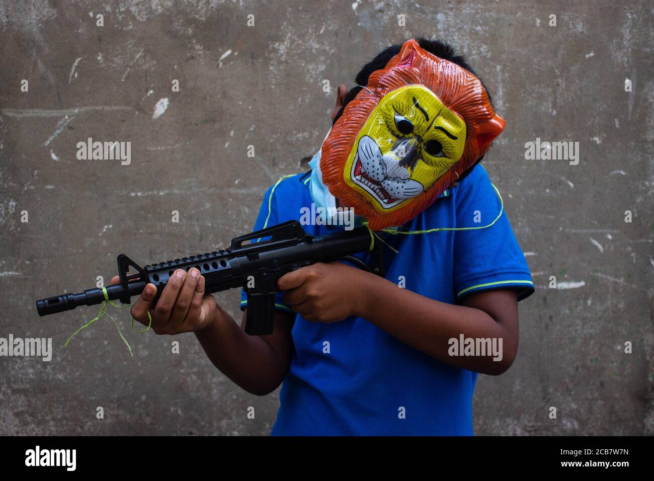 Dhaka, Dhaka, Bangladesh. 11th Aug, 2020. A boy poses for a photo while