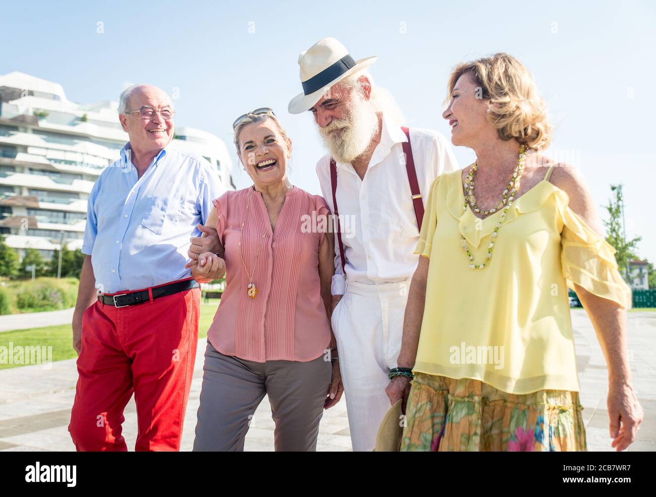 Group of seniors walking and having fun in the city Stock Photo