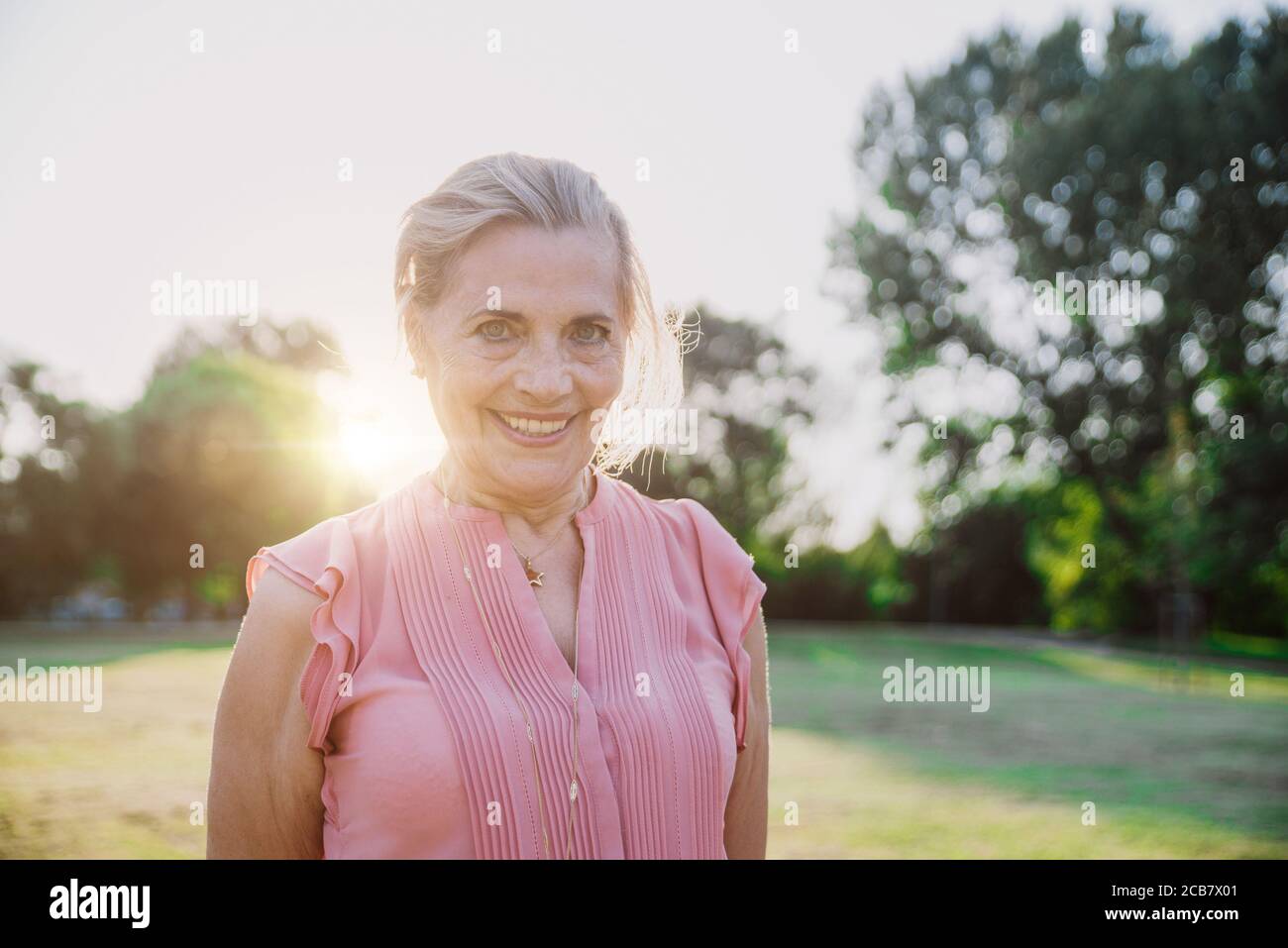 Happy grandmother enjoying sunset hi-res stock photography and images ...