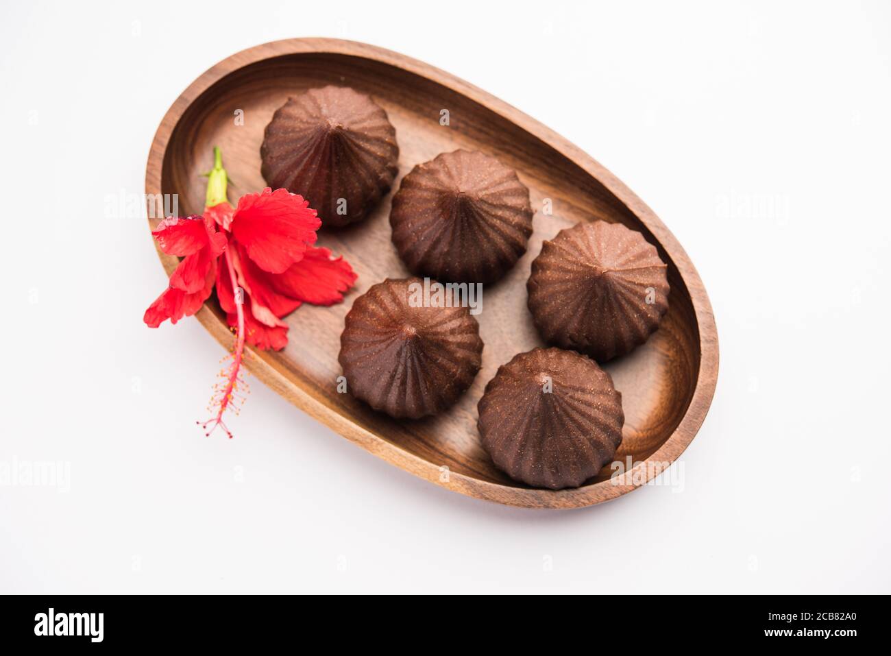 Clay Modak Chocolate Modak for Ganesh Chaturthi Puja or Ganesha festival Stock ...