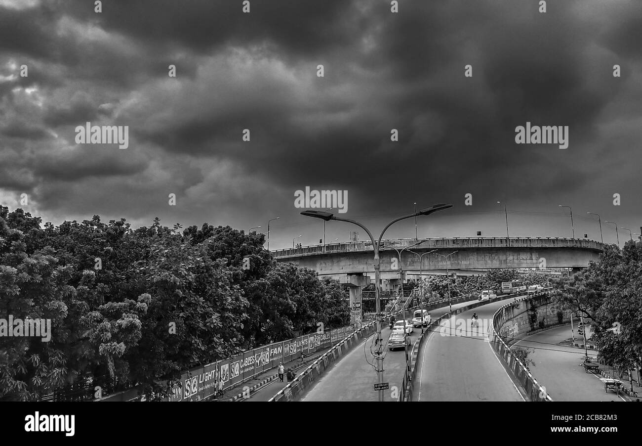 A beautiful flyover under cloudy summer sky . I captured this image from Khilgaon , Dhaka, Bangladesh . Stock Photo