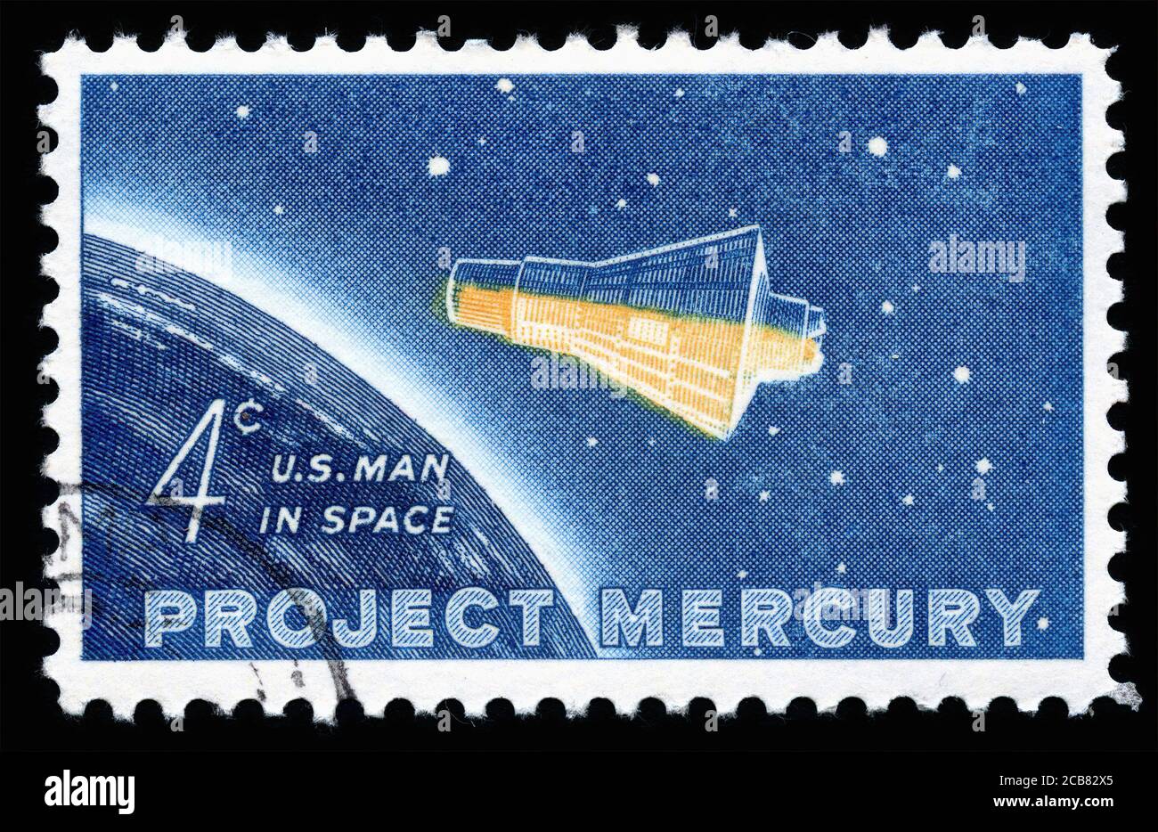 London, UK, February 19 2018 - Vintage 1962 USA 4 cents cancelled postage stamp showing  Project Mercury space flight stamp collecting stock photo Stock Photo