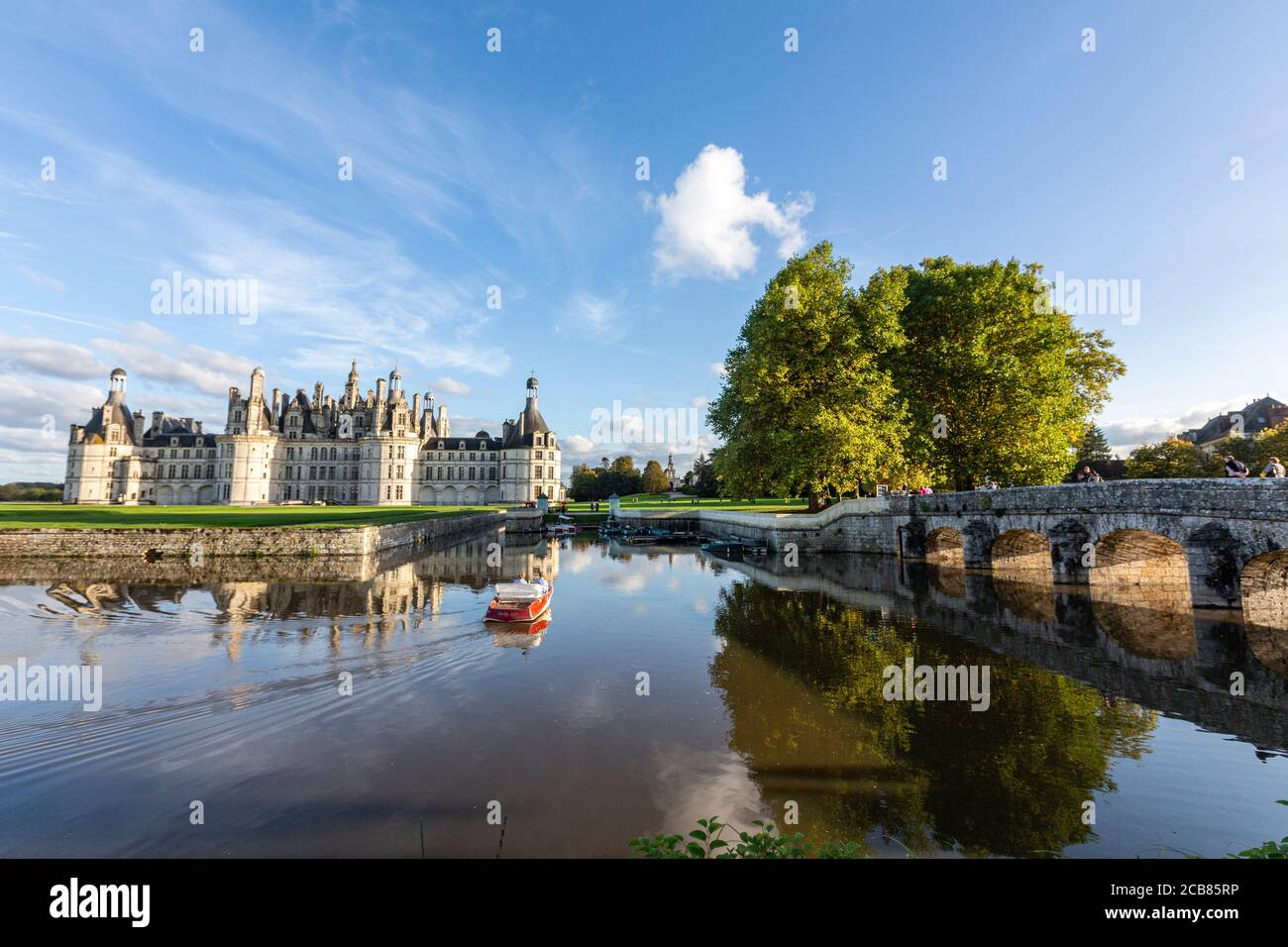 Tourist in boat looking the Château de Chambord, Chambord, Loir-et-Cher, France, Stock Photo