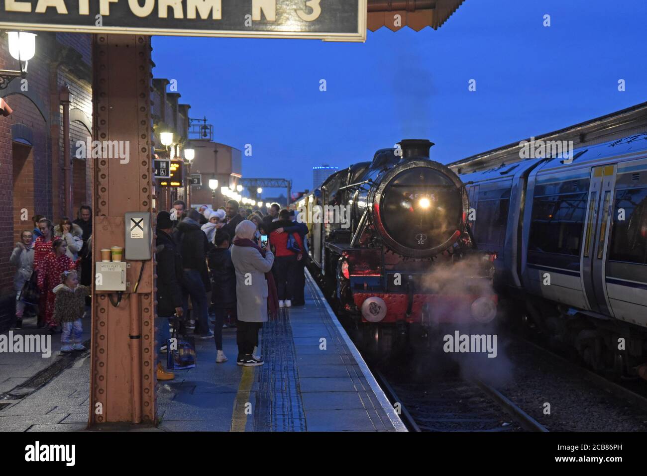 Passengers leaving the Polar Express, a Christmas steam special