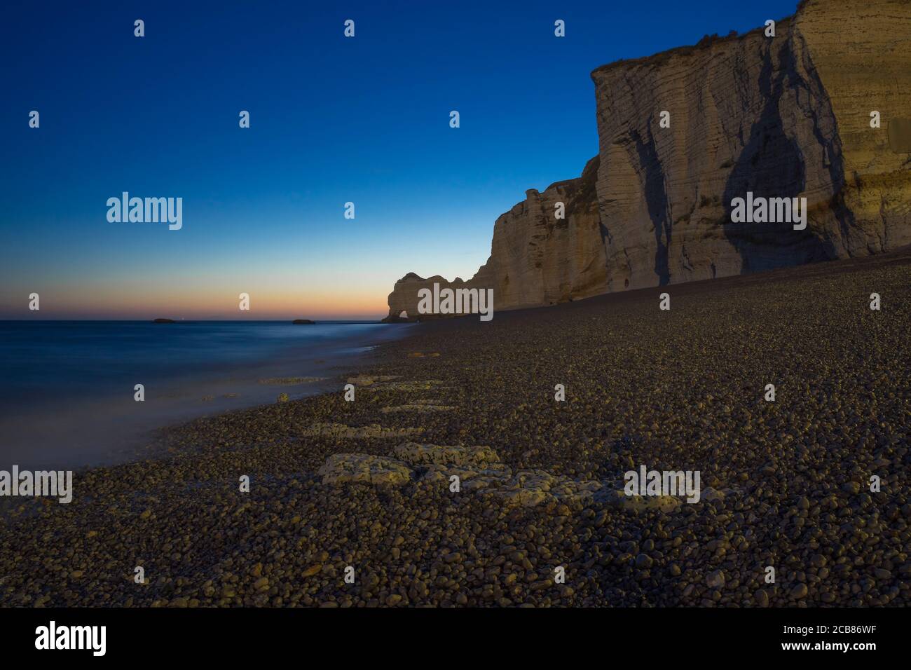 Night on the beach of Etretat Stock Photo - Alamy