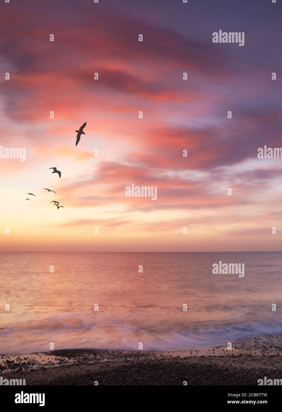 Composite image of sunrise on the Suffolk coast, UK Stock Photo