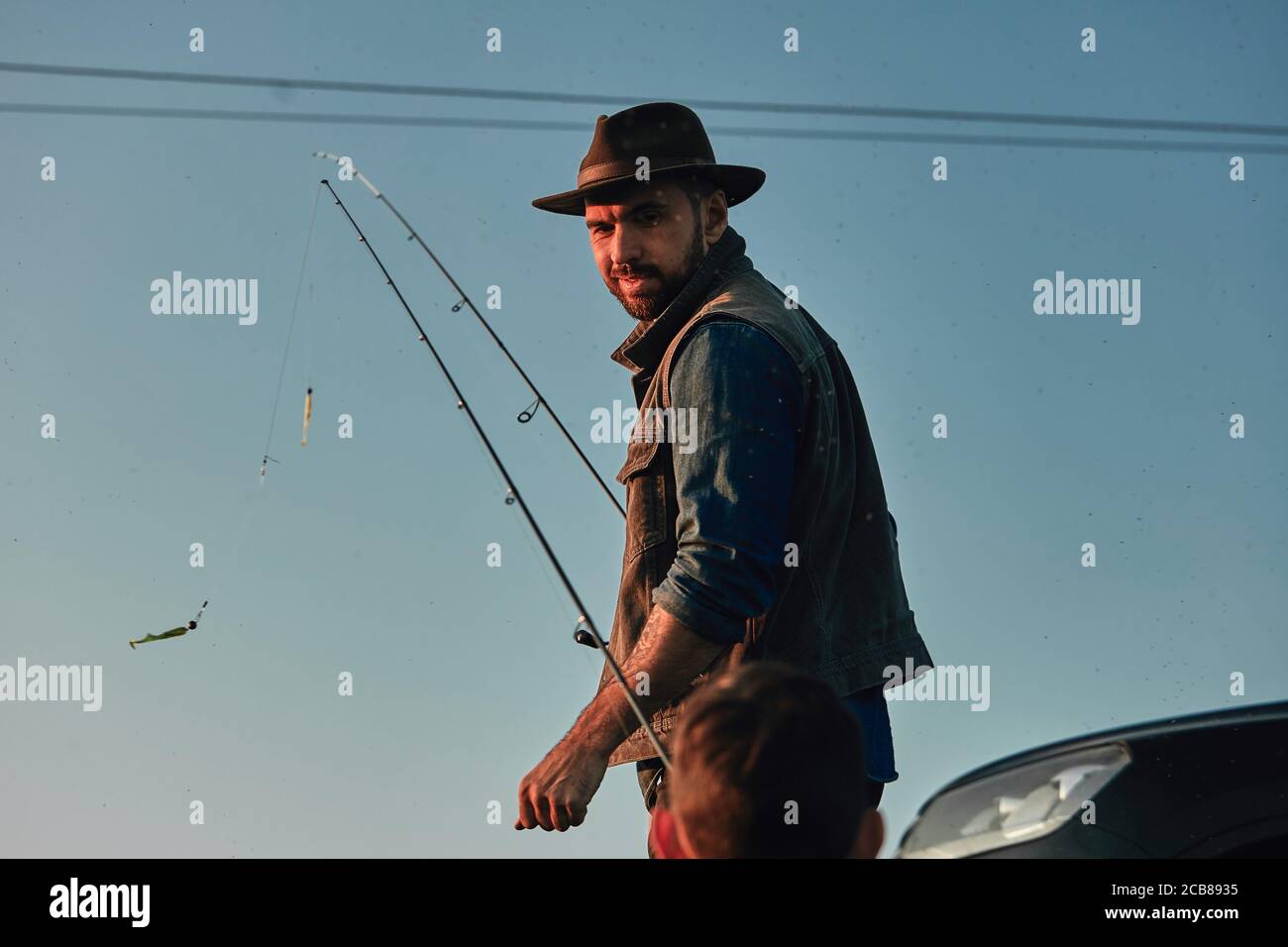 Man fishing and dog with fish hi-res stock photography and images - Page 2  - Alamy