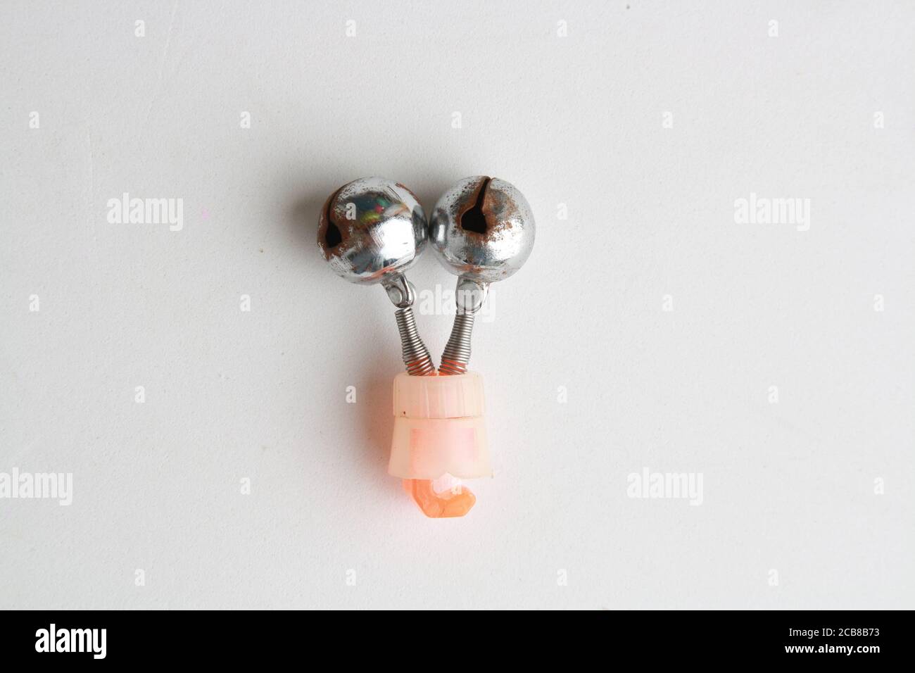 Top view of a fishing rattle to put on the tip of the fishing rod on a ...