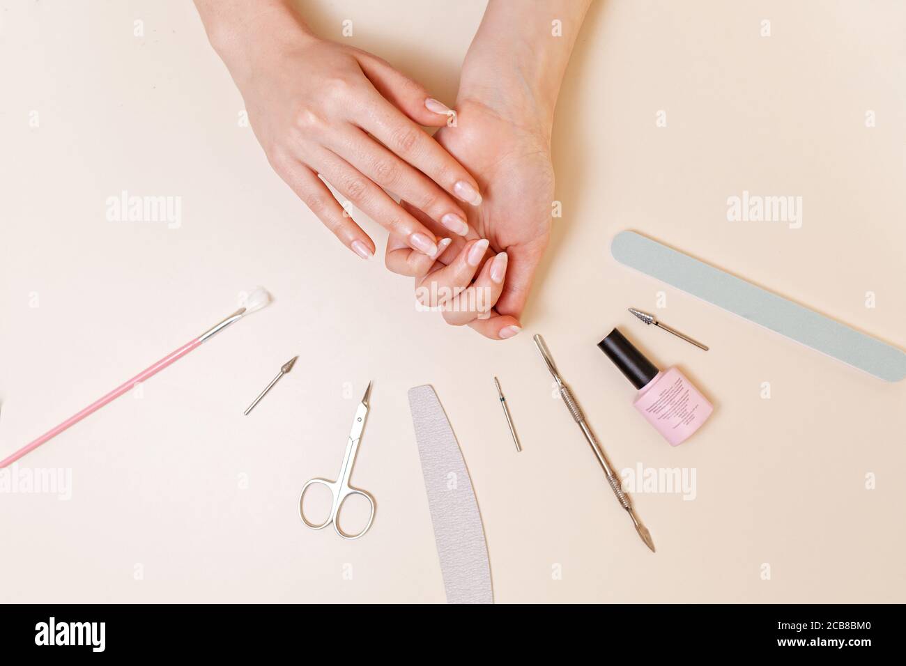 Medicine, cosmetology and manicure. A client in a nail salon