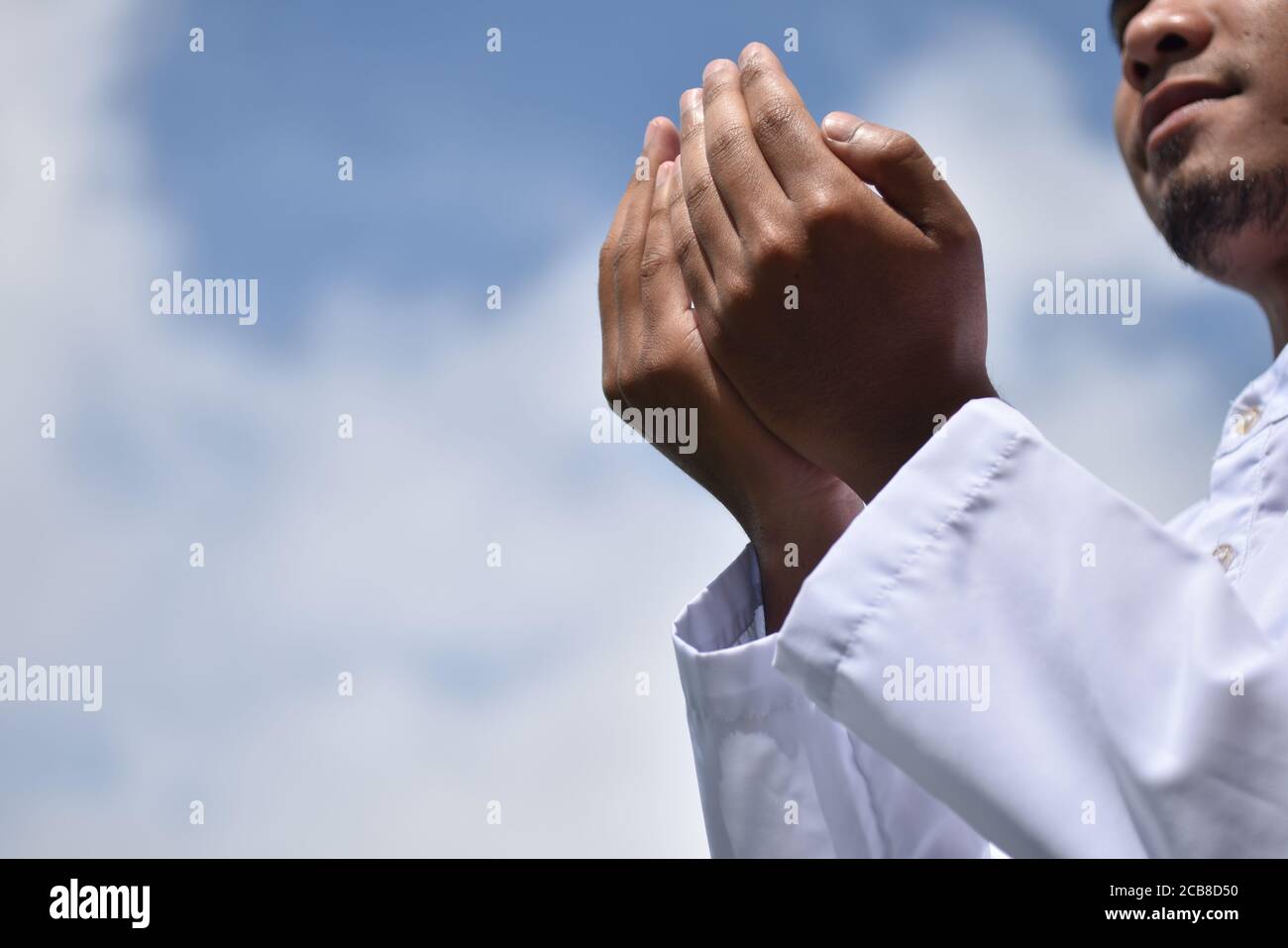 Religious muslim man praying hand Stock Photo - Alamy