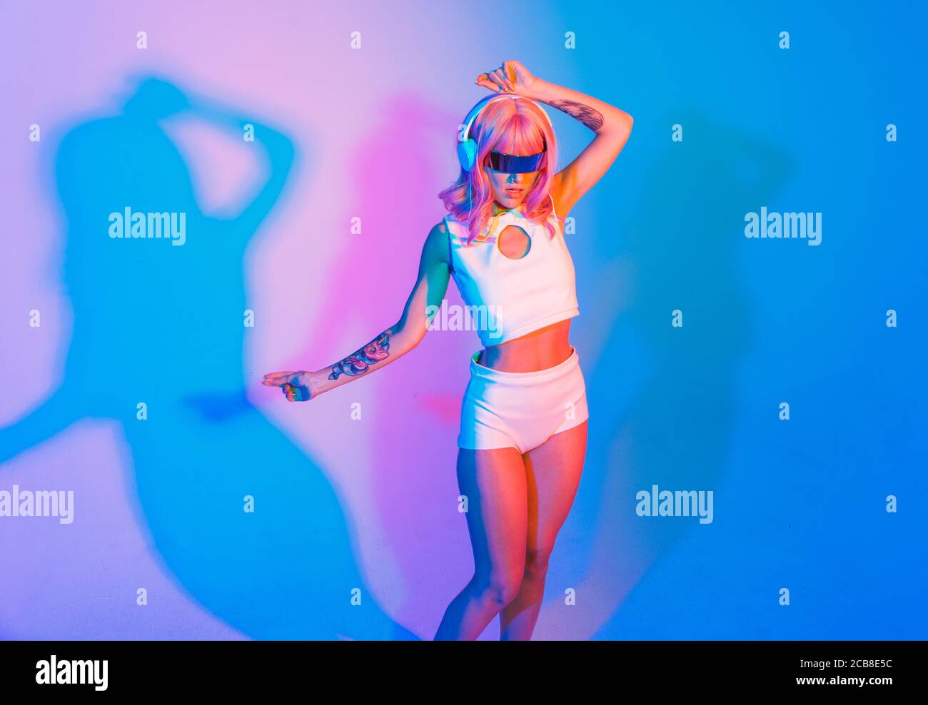 Fashion portrait of beautiful woman on colored background Stock Photo ...