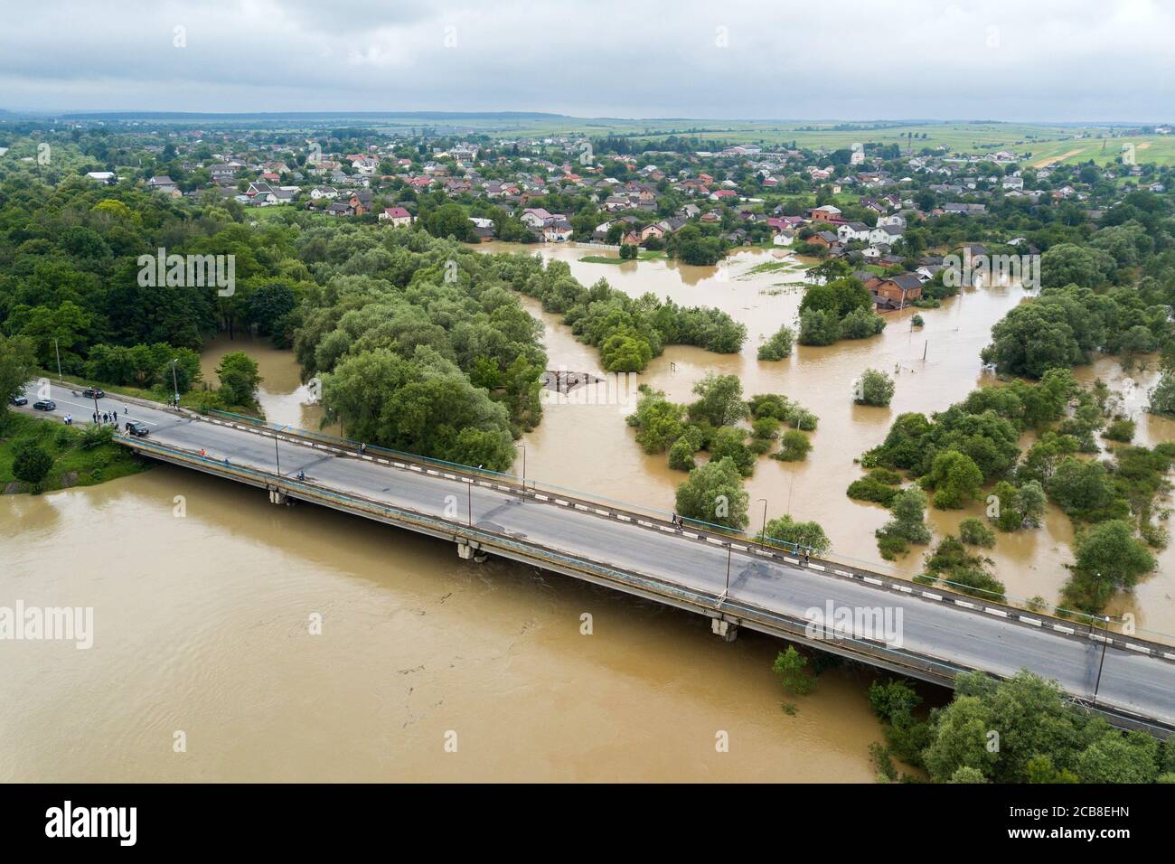 Aerial view of flooded houses with dirty water of Dnister river in Halych town, western Ukraine. Stock Photo