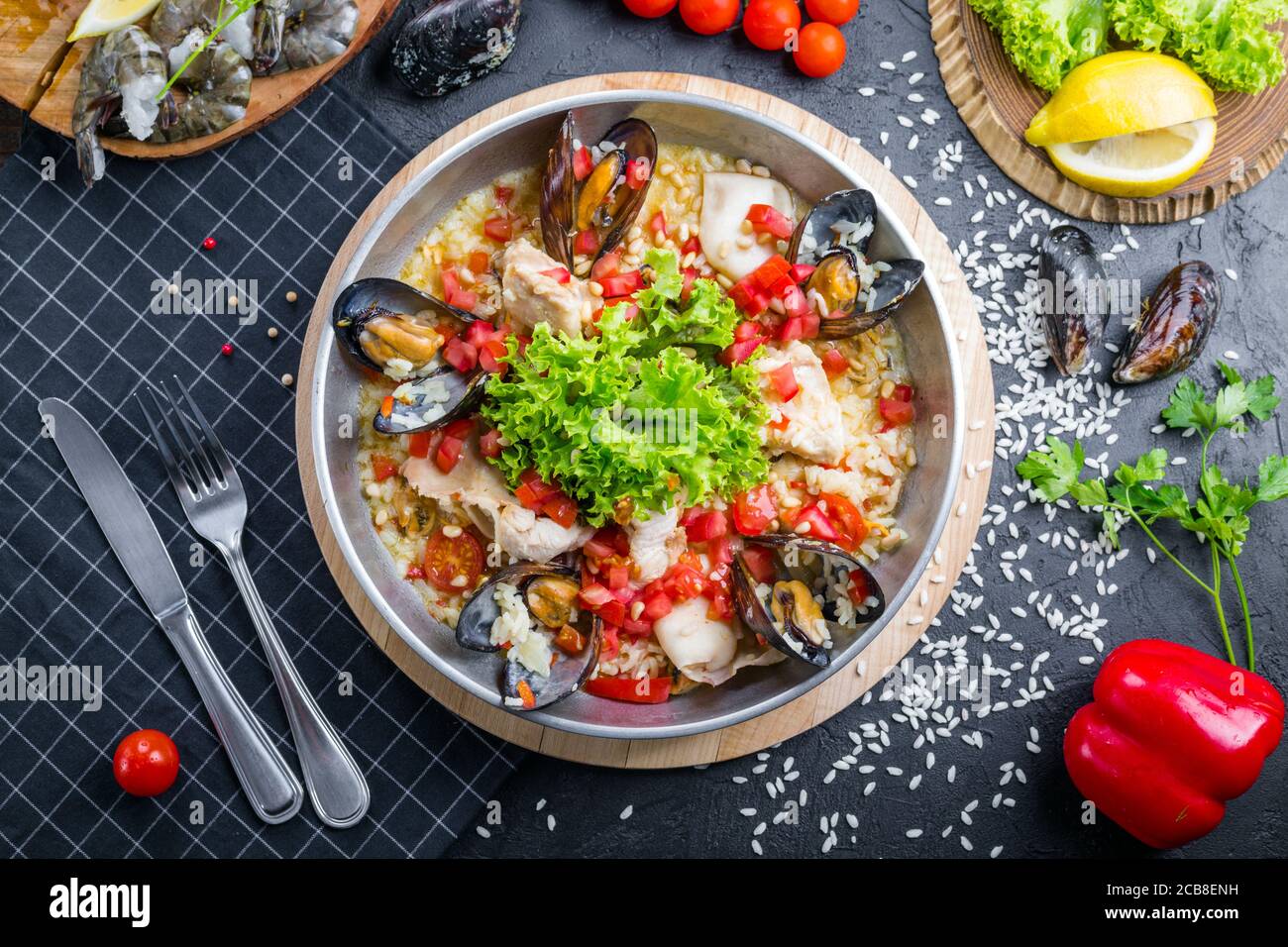 Risotto with seafood. Rice with mussels and shrimps. Stock Photo