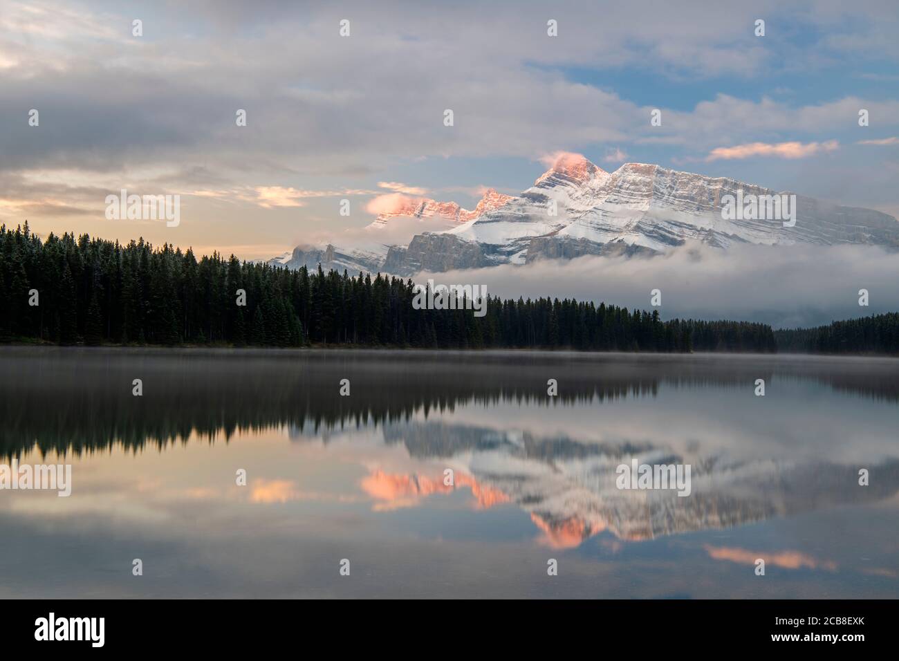 Mt. Rundle reflected in Two Jack Lake at dawn, Banff National Park, Alberta, Canada Stock Photo