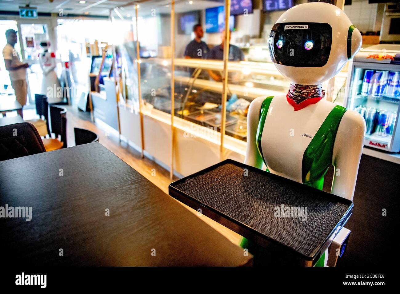 A special hostess robot at Amersfoort cafeteria Hakze as a preventive  measure against the spread of the coronavirus.Various means are being  invited to curb the ongoing covid 19 pandemic and using robots