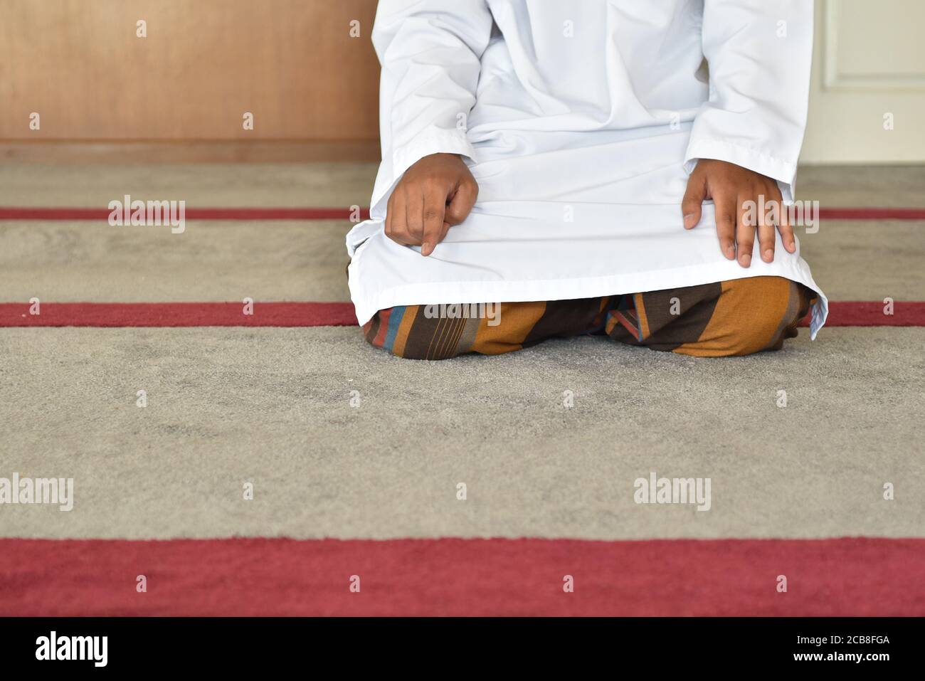 Tashhad Muslim men praying in Tashahhud posture Stock Photo - Alamy